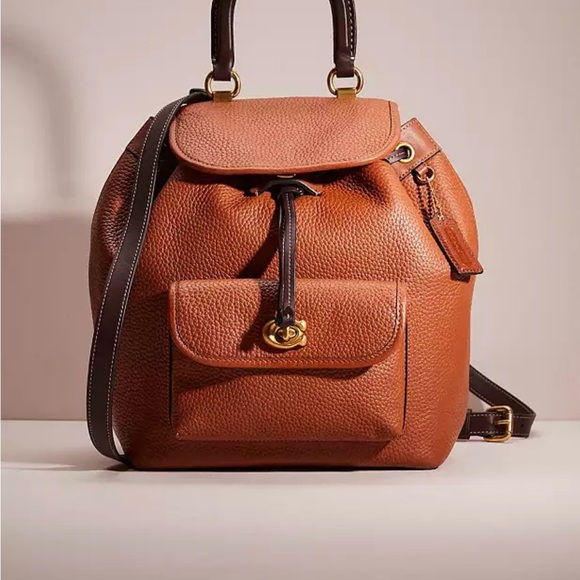 NWT. Coach Riya backpack. Has been stored in box in dust bag. Never used. - Picture 1 of 6